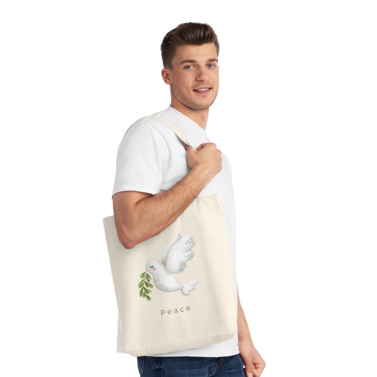 Cream-colored tote bag with a soft watercolor dove carrying olive leaves, above the word “Peace” in minimalist font.
